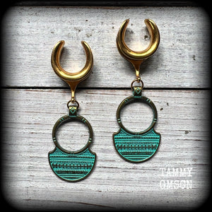 Inspired by Ishtar, Mesopotamian Goddess of love, beauty, sex and war, these beautiful tribal gauged earrings are nice and light weight, weighing approx 7 grams a piece, and measure just under 7cms from tip to tip.
This pair has been made on 5/8” gauge (16mm) surgical steel cradles, to be worn in stretched lobes.