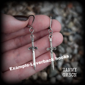 These awesome antique silver sword earrings are super light weight, weighing only a few grams each, and measure just under 4cms from tip to tip. This pair has been made on stainless steel leverback hooks.