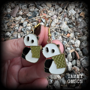 Super cute and super light weight, these earrings feature cute panda bear enamel charms, measuring just over 4cms from tip to tip and weighing only a few grams each.
This pair has been made with antique gold french hooks, for pierced ears.
