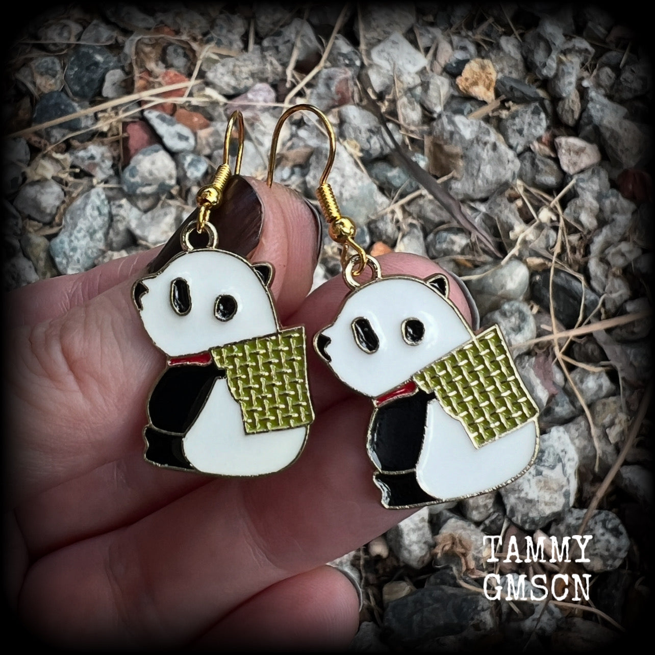 Super cute and super light weight, these earrings feature cute panda bear enamel charms, measuring just over 4cms from tip to tip and weighing only a few grams each.
This pair has been made with antique gold french hooks, for pierced ears.
