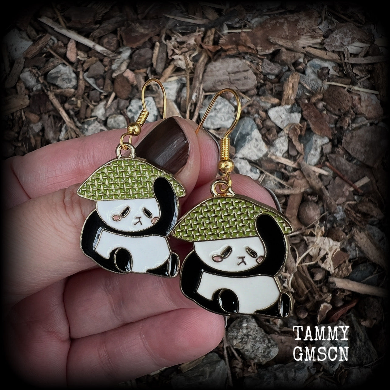 Super cute and super light weight, these earrings feature cute panda bear enamel charms, measuring just over 4cms from tip to tip and weighing only a few grams each.