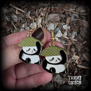 Super cute and super light weight, these earrings feature cute panda bear enamel charms, measuring just over 4cms from tip to tip and weighing only a few grams each.