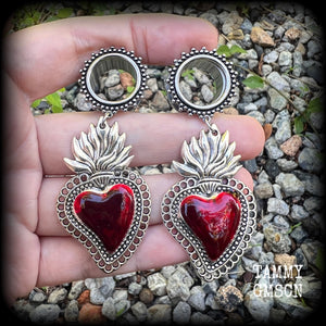These tunnel earrings feature gorgeous blood red enamel and antique silver sacred hearts, nice and lightweight at approx 13 grams each and measure approx 7.5cms from tip to tip.
This pair has made on 5/8" (16mm) gauge ornate surgical steel screw fit tunnels, for stretched lobes.
