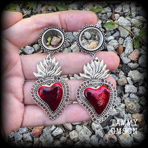 These tunnel earrings feature gorgeous blood red enamel and antique silver sacred hearts, nice and lightweight at approx 13 grams each and measure approx 7.5cms from tip to tip.
This pair has made on 5/8" (16mm) gauge ornate surgical steel screw fit tunnels, for stretched lobes.