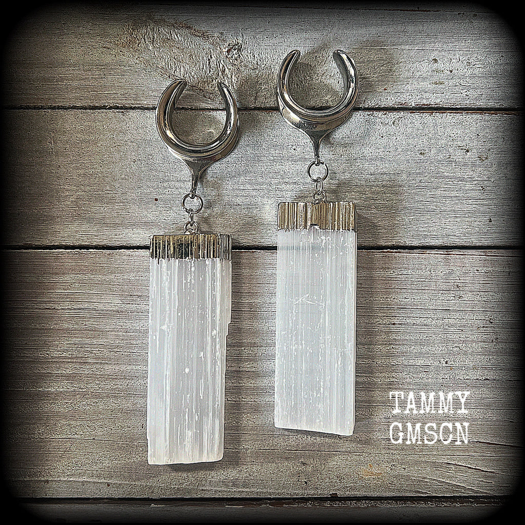 These gorgeous gauged earrings feature beautiful big selenite pieces, measuring just over 10cms from tip to tip, and weighing approx 25grams each.

This pair have been made on 3/4” gauge (19mm) surgical steel cradles, to be worn in stretched lobes.
