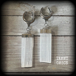 These gorgeous gauged earrings feature beautiful big selenite pieces, measuring just over 10cms from tip to tip, and weighing approx 25grams each.

This pair have been made on 3/4” gauge (19mm) surgical steel cradles, to be worn in stretched lobes.