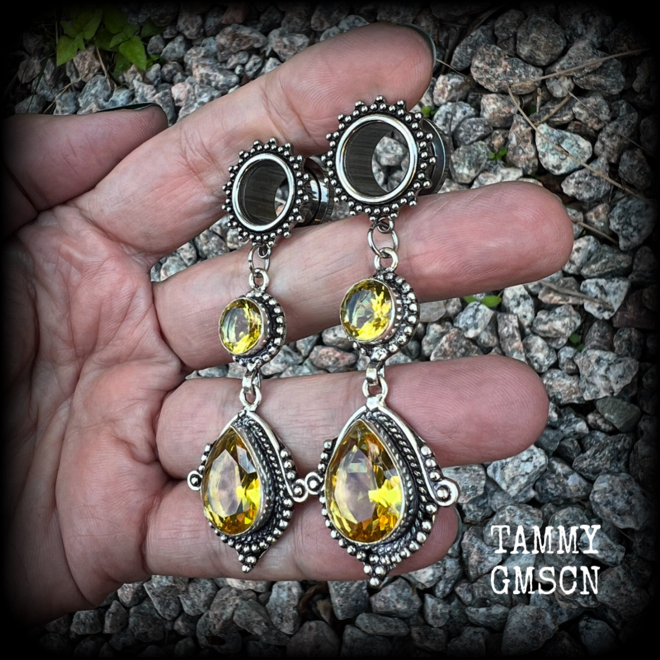 These gorgeous boho tunnel earrings have been made with beautiful yellow citrine gemstones in an antique silver setting, are light weight weighing approx 11 grams each and measure just over 7cms from tip to tip.  This pair have been made with  1/2” gauge (12mm) ornate surgical steel screw fit tunnels, for stretched lobes.
