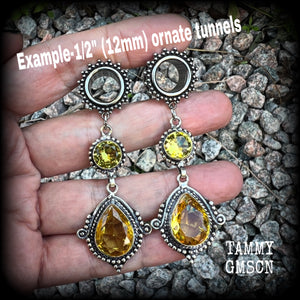 These gorgeous boho tunnel earrings have been made with beautiful yellow citrine gemstones in an antique silver setting, are light weight weighing approx 11 grams each and measure just over 7cms from tip to tip.  This pair have been made with  1/2” gauge (12mm) ornate surgical steel screw fit tunnels, for stretched lobes.