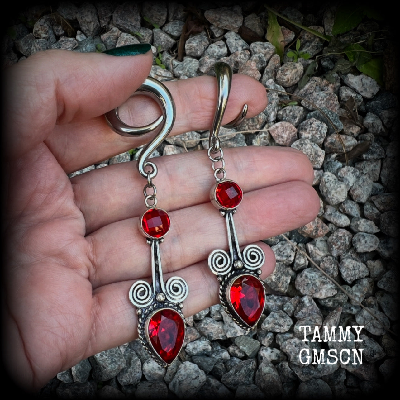 These stunning dangly gauged earrings feature gorgeous deep red faceted garnet gemstones in a beautiful boho antique silver setting, measuring just over 8cms from tip to tip, and weigh approx 12 grams each.  This pair have been made with 2 gauge (6mm) surgical steel full curl hooks, to be worn in stretched lobes.