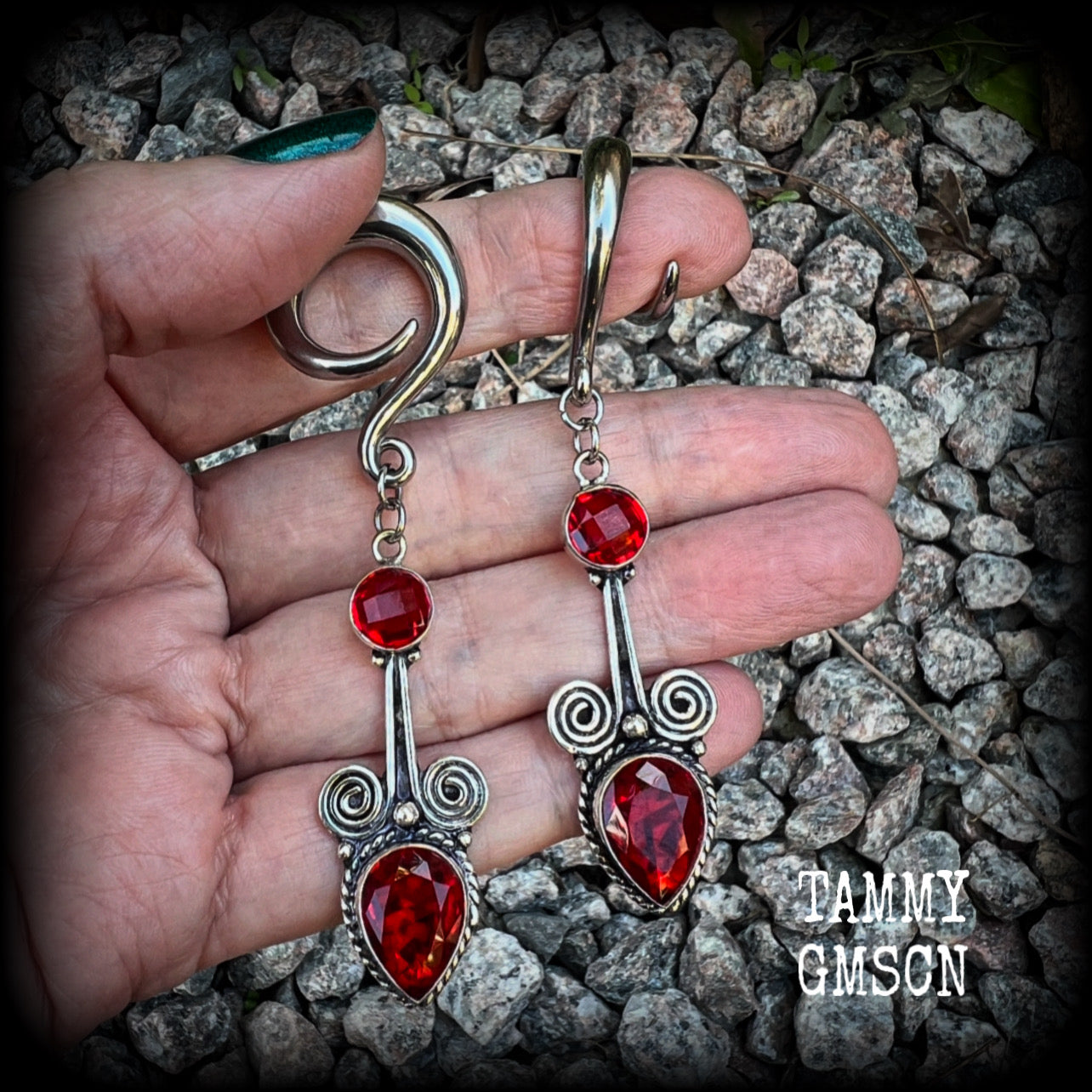 These stunning dangly gauged earrings feature gorgeous deep red faceted garnet gemstones in a beautiful boho antique silver setting, measuring just over 8cms from tip to tip, and weigh approx 12 grams each.  This pair have been made with 2 gauge (6mm) surgical steel full curl hooks, to be worn in stretched lobes.