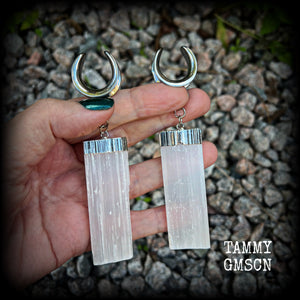 These gorgeous gauged earrings feature beautiful big selenite pieces, measuring just over 10cms from tip to tip, and weighing approx 25grams each.  This pair have been made on 3/4” gauge (19mm) surgical steel cradles, to be worn in stretched lobes.