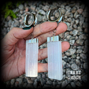 These gorgeous gauged earrings feature beautiful big selenite pieces, measuring just over 10cms from tip to tip, and weighing approx 25grams each.  This pair have been made on 3/4” gauge (19mm) surgical steel cradles, to be worn in stretched lobes.