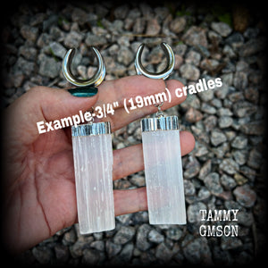 These gorgeous gauged earrings feature beautiful big selenite pieces, measuring just over 10cms from tip to tip, and weighing approx 25grams each.  This pair have been made on 3/4” gauge (19mm) surgical steel cradles, to be worn in stretched lobes.