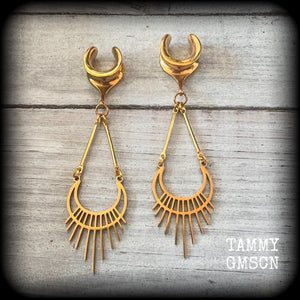 Inspired by Ishtar, Mesopotamian Goddess of love, beauty, sex and war, this beautiful pair of earrings features a golden stainless steel crescent moon with sunrays, measuring just on 8cms from tip to tip, and weighing only 5 grams a piece.

This pair has been made on 1/2” gauge (12mm) surgical steel cradles, to be worn in stretched lobes.