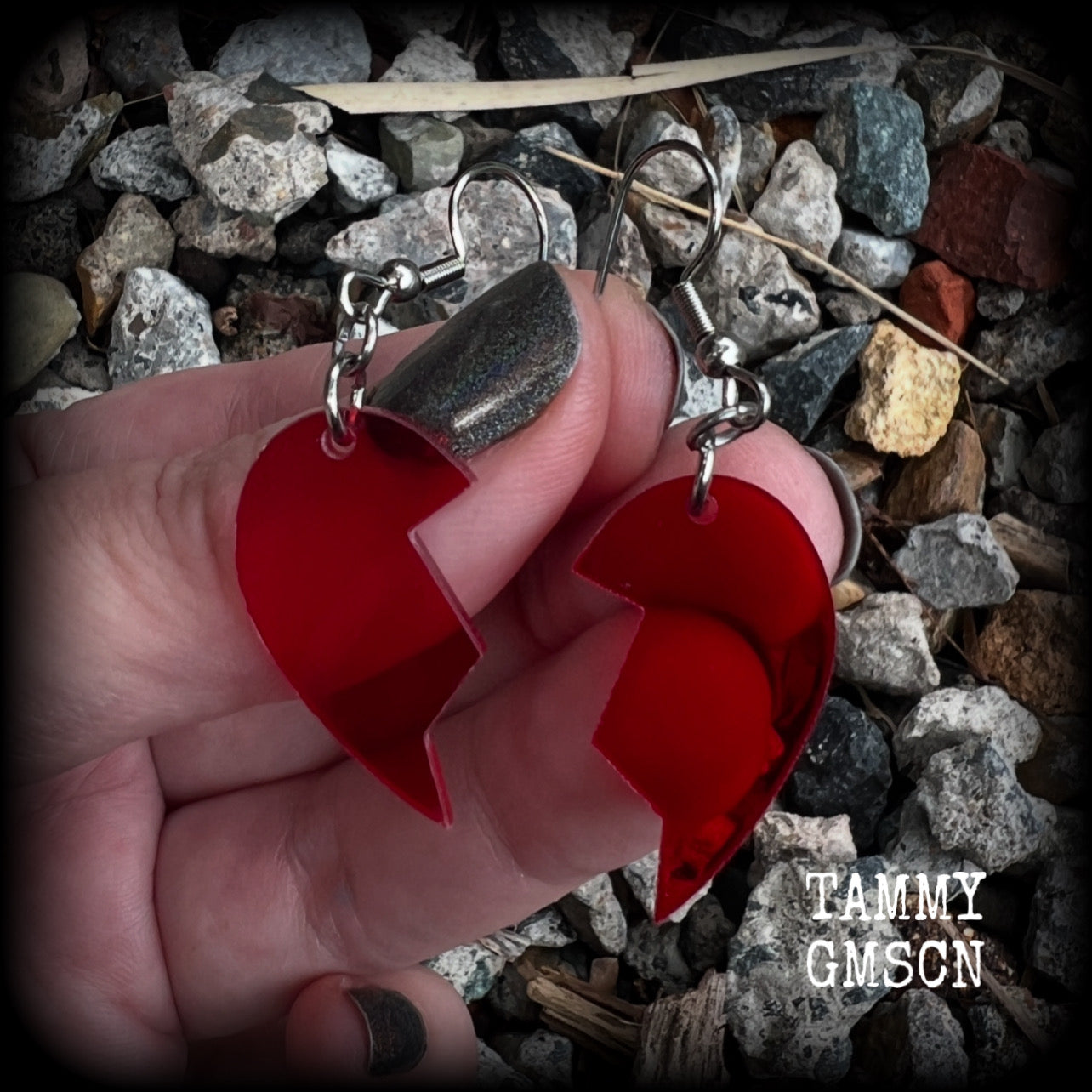 This pair of earrings feature a red acrylic heart broken in two, measuring just over 5cms from tip to tip, these earrings are lovely and lightweight, weighing only a few grams each. This pair has been made on stainless steel french hooks