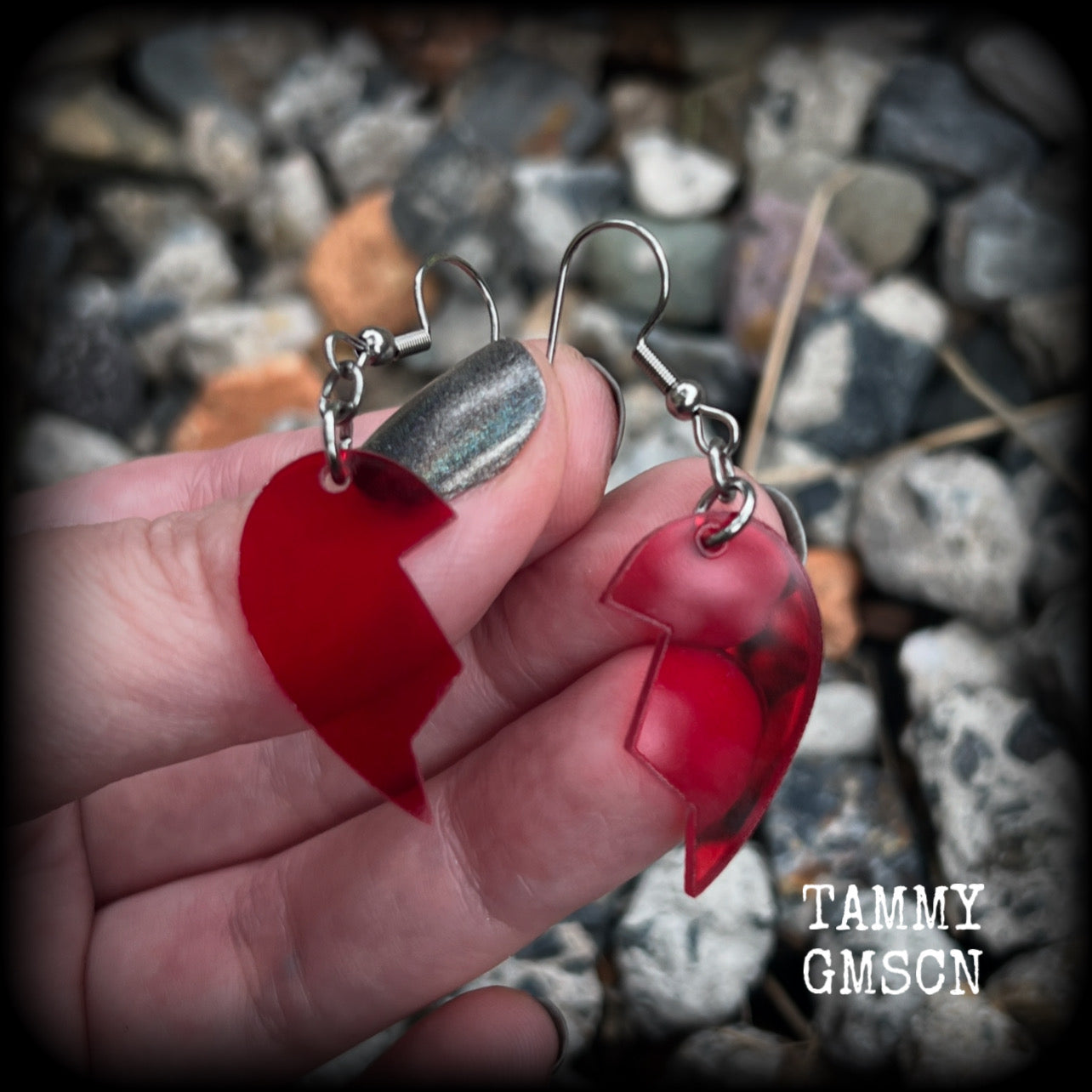 This pair of earrings feature a red acrylic heart broken in two, measuring just over 5cms from tip to tip, these earrings are lovely and lightweight, weighing only a few grams each. This pair has been made on stainless steel french hooks