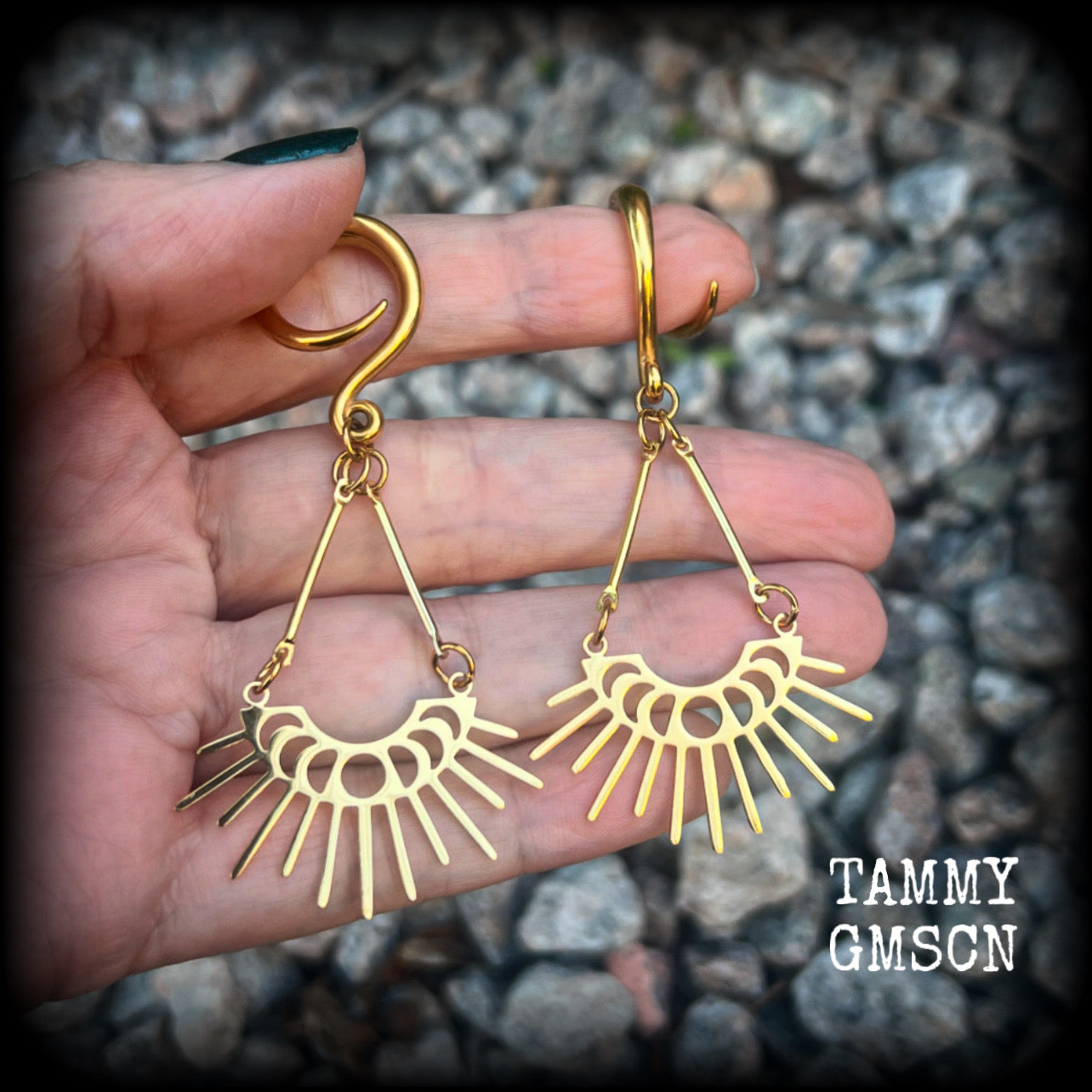 These beautiful witchy titanium 'Moon phase' gauged earrings feature gorgeous antique gold moon phase pendants with sun rays, nice and dangly, measuring just over 7.5cms from tip to tip, and weighing only 5 grams a piece .  This pair has been made on 6 gauge (4mm) surgical steel full curl hooks, to be worn in stretched lobes.