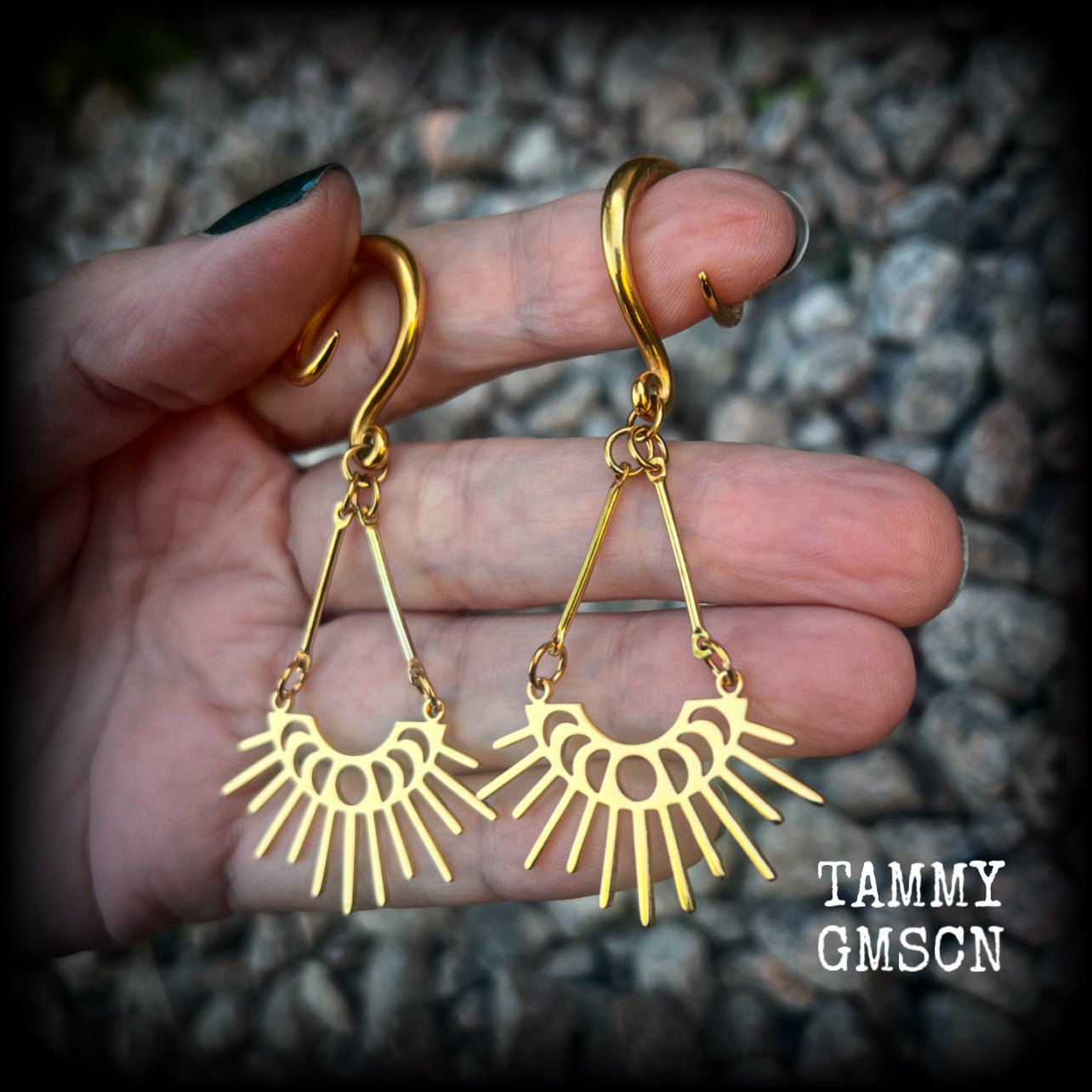 These beautiful witchy titanium 'Moon phase' gauged earrings feature gorgeous antique gold moon phase pendants with sun rays, nice and dangly, measuring just over 7.5cms from tip to tip, and weighing only 5 grams a piece .  This pair has been made on 6 gauge (4mm) surgical steel full curl hooks, to be worn in stretched lobes.