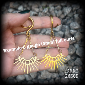 These beautiful witchy titanium 'Moon phase' gauged earrings feature gorgeous antique gold moon phase pendants with sun rays, nice and dangly, measuring just over 7.5cms from tip to tip, and weighing only 5 grams a piece .  This pair has been made on 6 gauge (4mm) surgical steel full curl hooks, to be worn in stretched lobes.