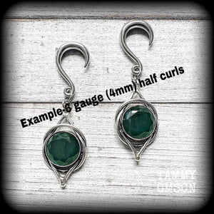 These gorgeous gauged earrings feature a pair of stunning sea green quartz gemstones in a beautiful antique silver boho setting, lovely and dangly measuring approx 6.5cms from tip to tip, and weigh approx 7 grams each.
 This pair has been made on 6 gauge (4mm) surgical steel half curl hooks, suitable for stretched lobes.