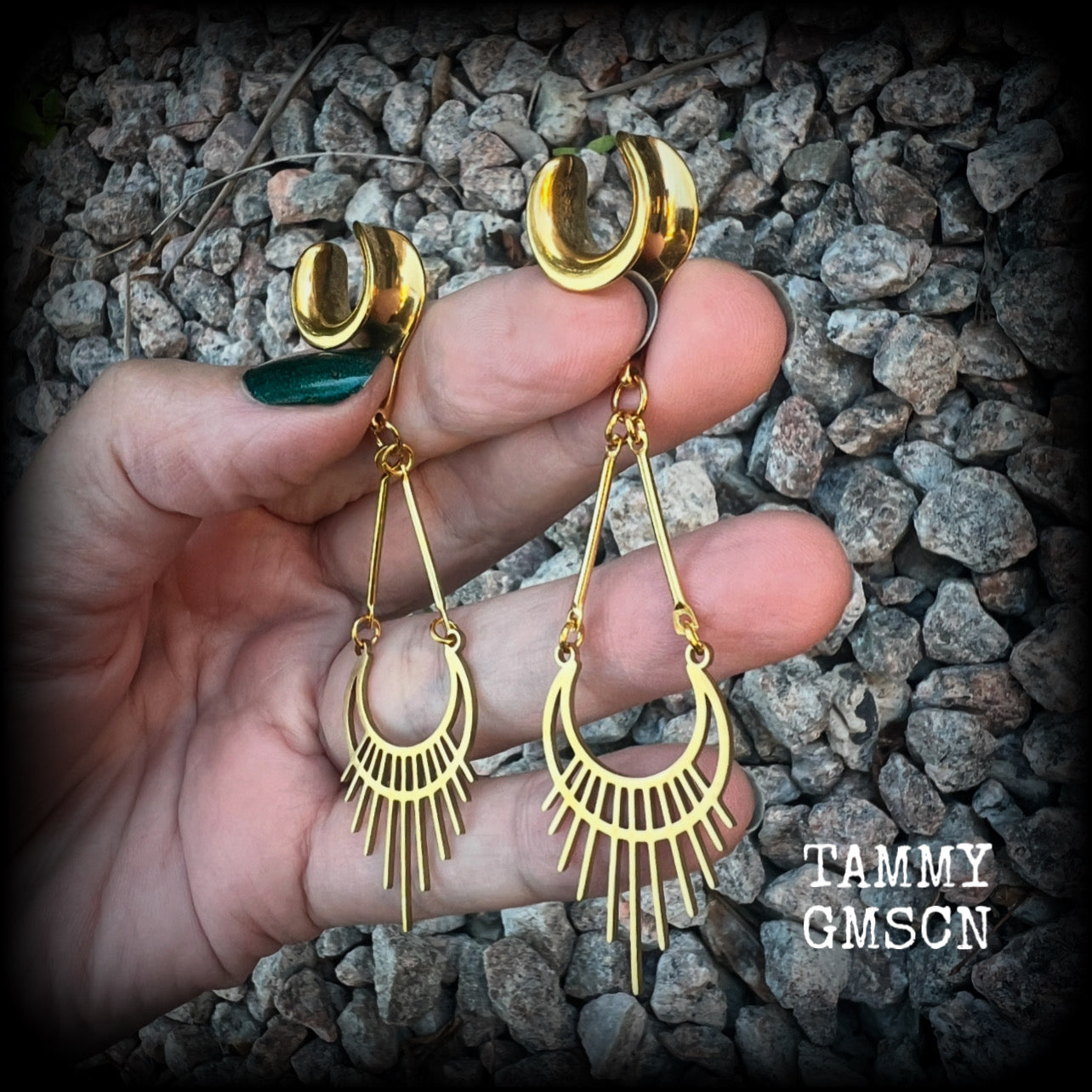 Inspired by Ishtar, Mesopotamian Goddess of love, beauty, sex and war, this beautiful pair of earrings features a golden stainless steel crescent moon with sunrays,  measuring just on 8cms from tip to tip, and weighing only 5 grams a piece.

This pair has been made on 1/2” gauge (12mm) surgical steel cradles, to be worn in stretched lobes.