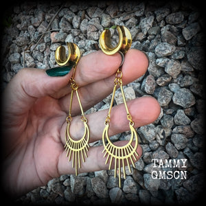 Inspired by Ishtar, Mesopotamian Goddess of love, beauty, sex and war, this beautiful pair of earrings features a golden stainless steel crescent moon with sunrays,  measuring just on 8cms from tip to tip, and weighing only 5 grams a piece.

This pair has been made on 1/2” gauge (12mm) surgical steel cradles, to be worn in stretched lobes.