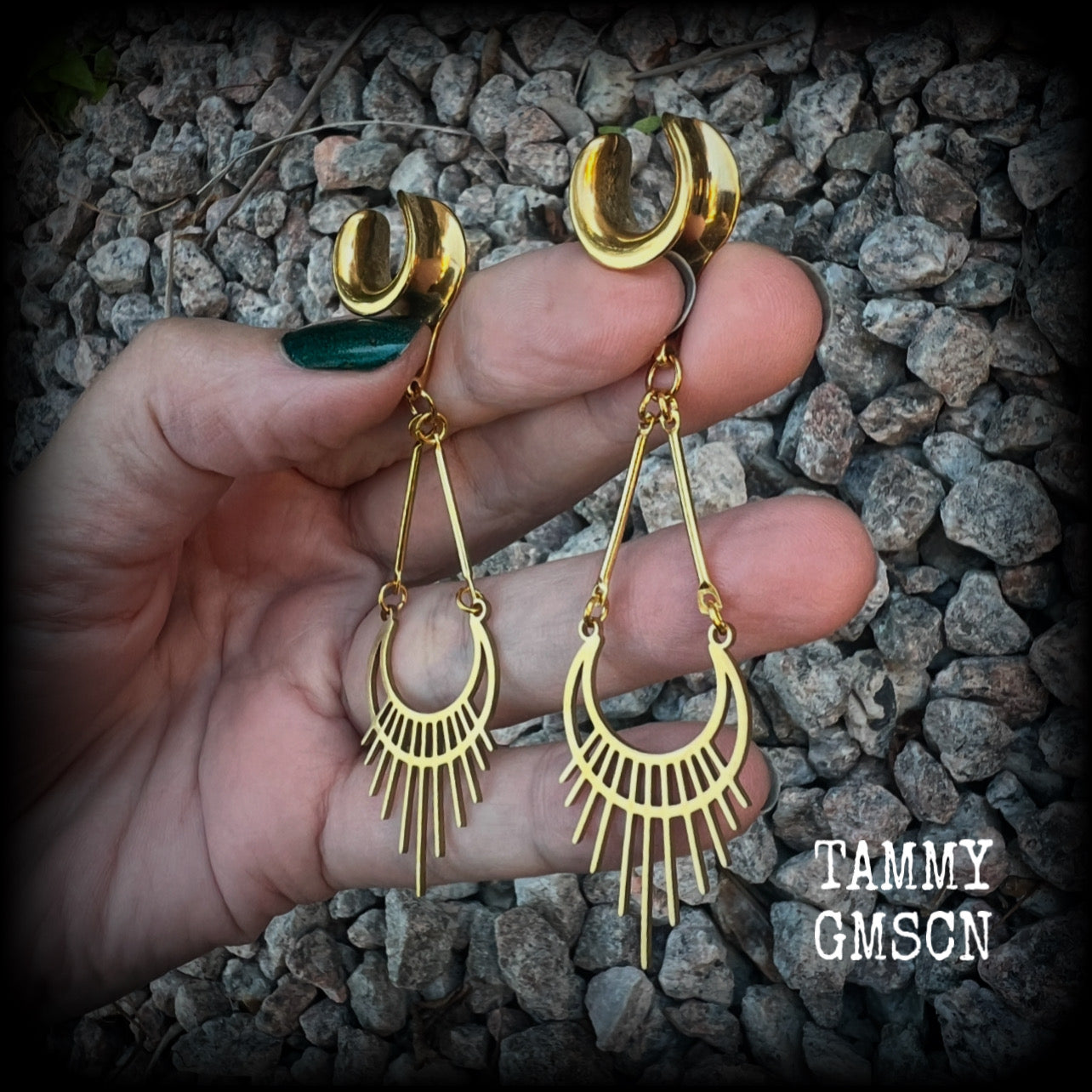 Inspired by Ishtar, Mesopotamian Goddess of love, beauty, sex and war, this beautiful pair of earrings features a golden stainless steel crescent moon with sunrays,  measuring just on 8cms from tip to tip, and weighing only 5 grams a piece.

This pair has been made on 1/2” gauge (12mm) surgical steel cradles, to be worn in stretched lobes.