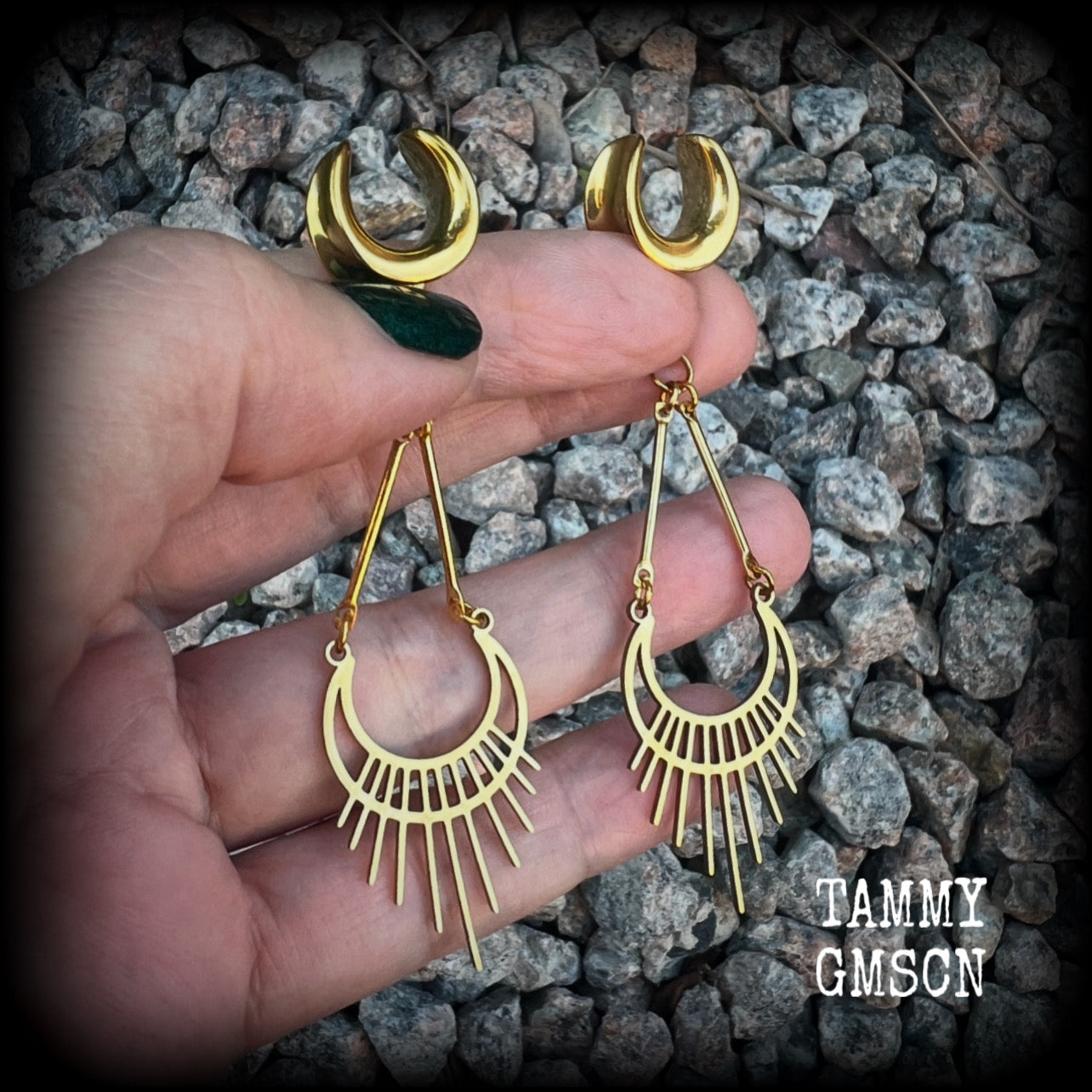 Inspired by Ishtar, Mesopotamian Goddess of love, beauty, sex and war, this beautiful pair of earrings features a golden stainless steel crescent moon with sunrays,  measuring just on 8cms from tip to tip, and weighing only 5 grams a piece.

This pair has been made on 1/2” gauge (12mm) surgical steel cradles, to be worn in stretched lobes.