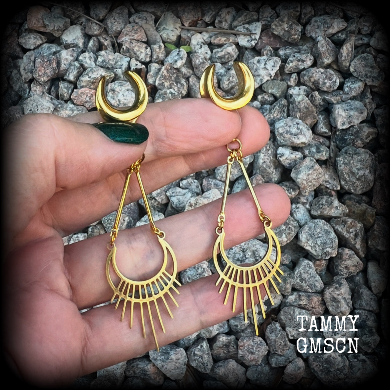 Inspired by Ishtar, Mesopotamian Goddess of love, beauty, sex and war, this beautiful pair of earrings features a golden stainless steel crescent moon with sunrays,  measuring just on 8cms from tip to tip, and weighing only 5 grams a piece.

This pair has been made on 1/2” gauge (12mm) surgical steel cradles, to be worn in stretched lobes.