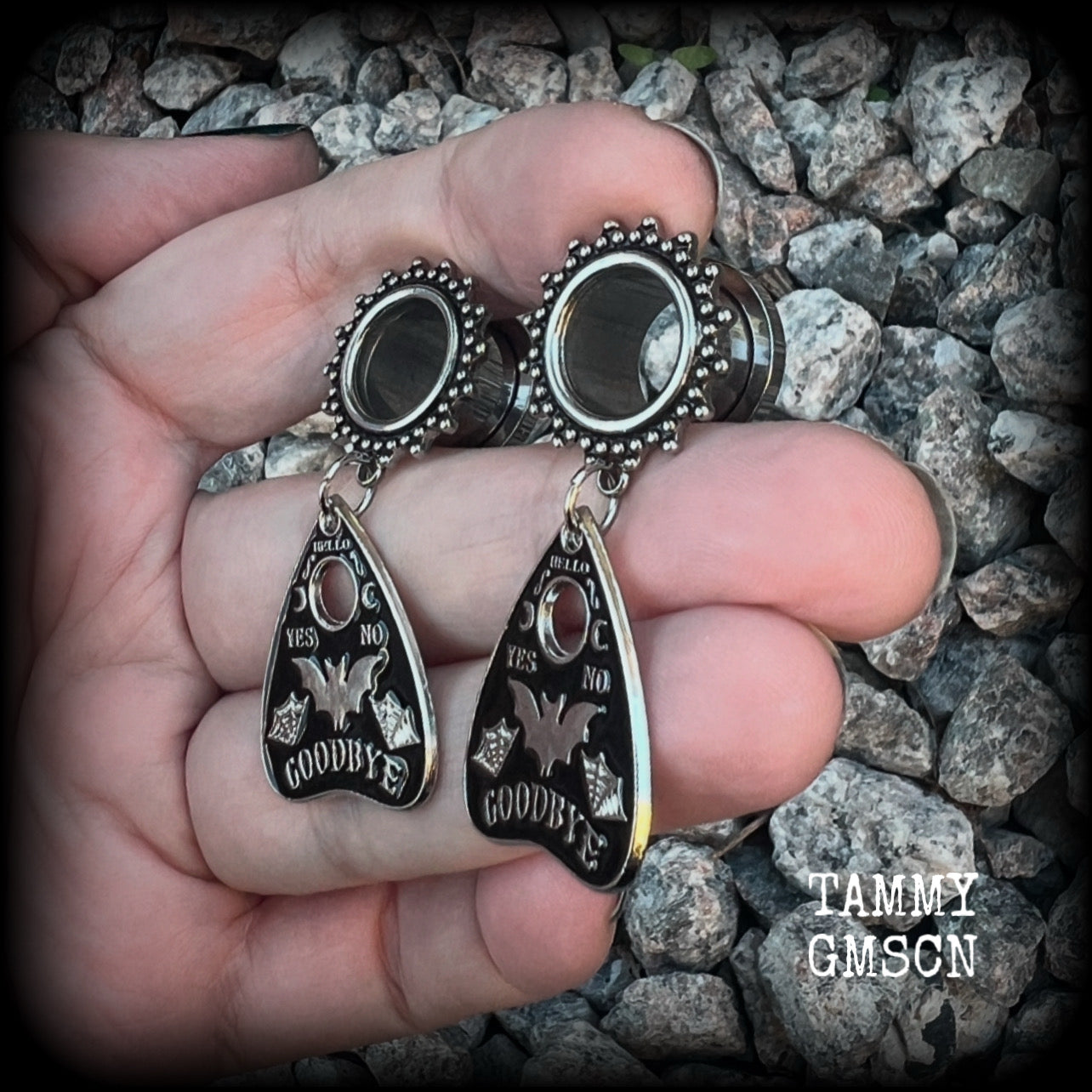 These gorgeous spooky tunnel dangles feature cute black enamel bat planchette charms, are nice and lightweight-weighing only 6 grams each and measure just under 5cms from tip to tip.  This pair have been made on 1/2” (12mm) gauge ornate surgical steel screw fit tunnels.