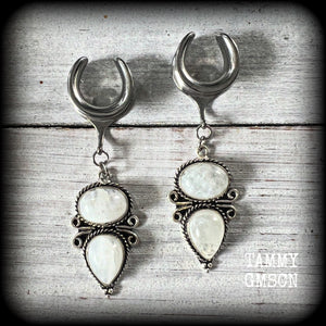 These beautiful boho moonstone earrings are made with gorgeous polished gemstones in an antique silver setting, lovely and dangly measuring approx 7cms from tip to tip, and weighing approx 12 grams each.

These earrings have been made on 5/8” gauge (16mm) surgical steel cradles, to be worn in stretched lobes.