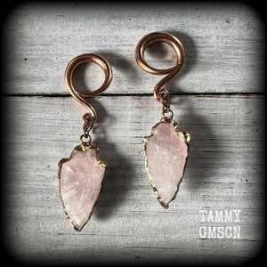 These earrings feature gorgeous baby pink arrowhead gemstones, measuring just over 6.5cms from tip to tip, and weighing approx 8 grams each, nice and dangly and not too heavy.

These earrings have been made on 6 gauge (4mm) surgical steel full curls, to be worn in stretched lobes.