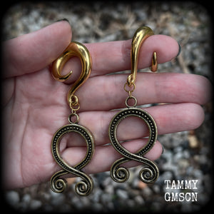 These beautiful gauged earrings feature antique gold troll cross pendants, weighing approx 24 grams each, and are nice and dangly, measuring just on 8.5cms from tip to tip. This pair have been made on 0 gauge (8mm) surgical steel full curl hooks.