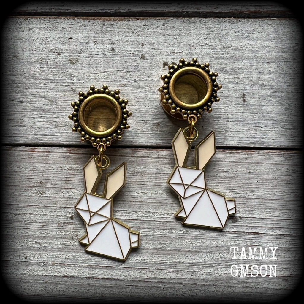 These earrings feature a pair of antique gold and white enamel origami rabbits, are nice and lightweight at only 6 grams each and measure approx 5cms from tip to tip. This pair has been made on 00 gauge (10mm) ornate surgical steel screw fit tunnels
