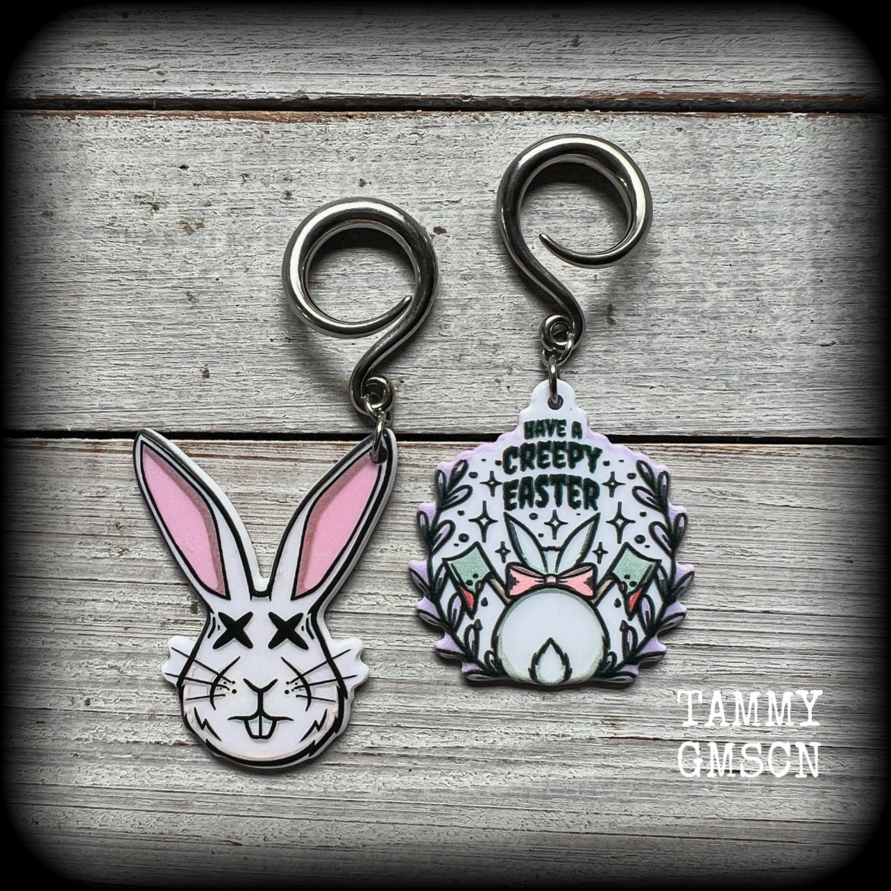 Featuring super cute, slightly creepy zombie rabbit acrylic charms, these earrings weigh approx 5 grams each, and are lovely and dangly at approx 6.5cms from tip to tip. This pair has been made on 6 gauge (4mm) surgical steel full curl hooks.