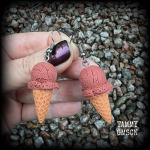 This pair of classic waffle cone ice cream earrings measures just under 6 cms from tip to tip, and weigh approx 5 grams a piece (not too heavy).

This pair have been made with stainless steel french hooks, for pierced ears.