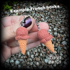 This pair of classic waffle cone ice cream earrings measures just under 6 cms from tip to tip, and weigh approx 5 grams a piece (not too heavy).

This pair have been made with stainless steel french hooks, for pierced ears.