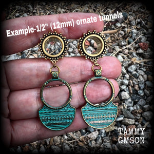 Inspired by Ishtar, Mesopotamian Goddess of love, beauty, sex and war, these beautiful tribal gauged earrings measure just on 6 cms from tip to tip, and weigh approx 8 grams a piece.
This pair has been made on 1/2” gauge (12mm) surgical steel ornate screw fit tunnels, to be worn in stretched lobes.