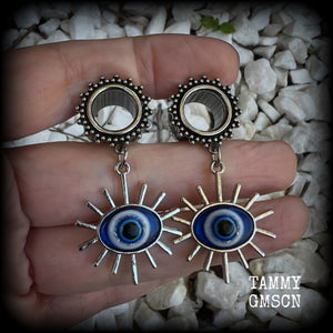 These stunning tunnel earrings feature gorgeous blue and white enamel and antique silver turkish evil eye charms, are nice and lightweight, weighing approx 10 grams each, measuring approx 6cms from tip to tip.

This pair has been made on 1/2” (12mm) gauge ornate surgical steel screw fit tunnels.