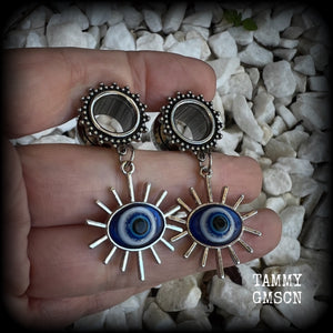 These stunning tunnel earrings feature gorgeous blue and white enamel and antique silver turkish evil eye charms, are nice and lightweight, weighing approx 10 grams each, measuring approx 6cms from tip to tip.

This pair has been made on 1/2” (12mm) gauge ornate surgical steel screw fit tunnels.