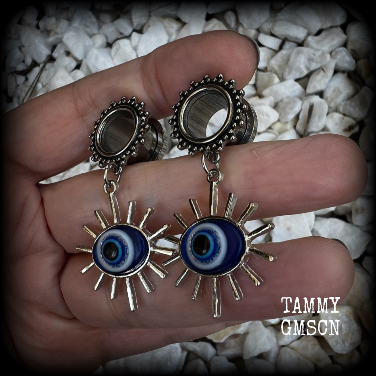 These stunning tunnel earrings feature gorgeous blue and white enamel and antique silver turkish evil eye charms, are nice and lightweight, weighing approx 10 grams each, measuring approx 6cms from tip to tip.

This pair has been made on 1/2” (12mm) gauge ornate surgical steel screw fit tunnels.