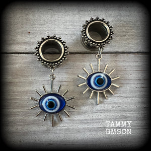 These stunning tunnel earrings feature gorgeous blue and white enamel and antique silver turkish evil eye charms, are nice and lightweight, weighing approx 10 grams each, measuring approx 6cms from tip to tip.

This pair has been made on 1/2” (12mm) gauge ornate surgical steel screw fit tunnels.