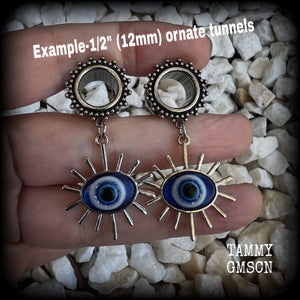 These stunning tunnel earrings feature gorgeous blue and white enamel and antique silver turkish evil eye charms, are nice and lightweight, weighing approx 10 grams each, measuring approx 6cms from tip to tip.

This pair has been made on 1/2” (12mm) gauge ornate surgical steel screw fit tunnels.