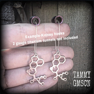 These awesome earrings feature cute little antique silver LSD molecules, measuring just over 6.5cms from tip to tip, and are nice and light weight at only a few grams each.

This pair have been made on antique silver kidney hooks, to be worn in pierced ears or stretched lobes.