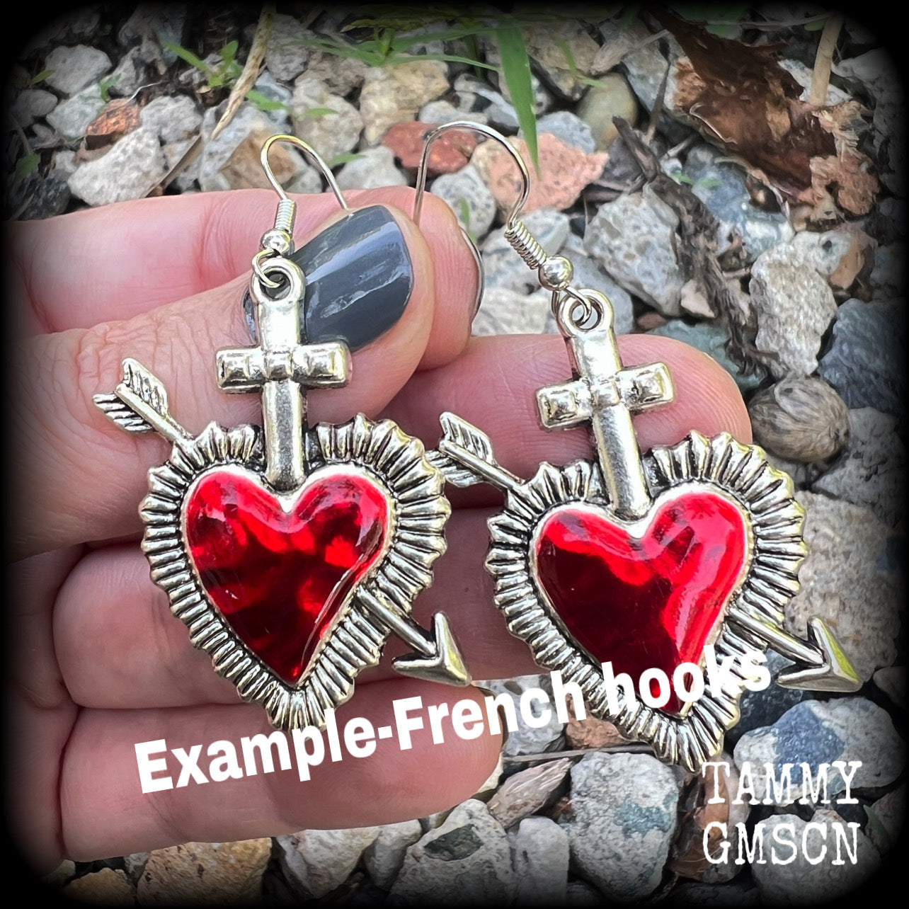 These beautiful red enamel and antique silver heart earrings are nice and lightweight at approx 5 grams a piece, and not too dangly, measuring just over 5cms from tip to tip.
This pair has been made on stainless steel french hooks to be worn through pierced ears.