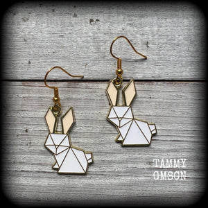Super cute and super light weight, these adorable earrings feature white enamel and antique gold origami white rabbit charms.

Measuring approx 4cm from tip to tip and weighing only a gram or two each, this pair has been made with french hooks-for pierced ears.