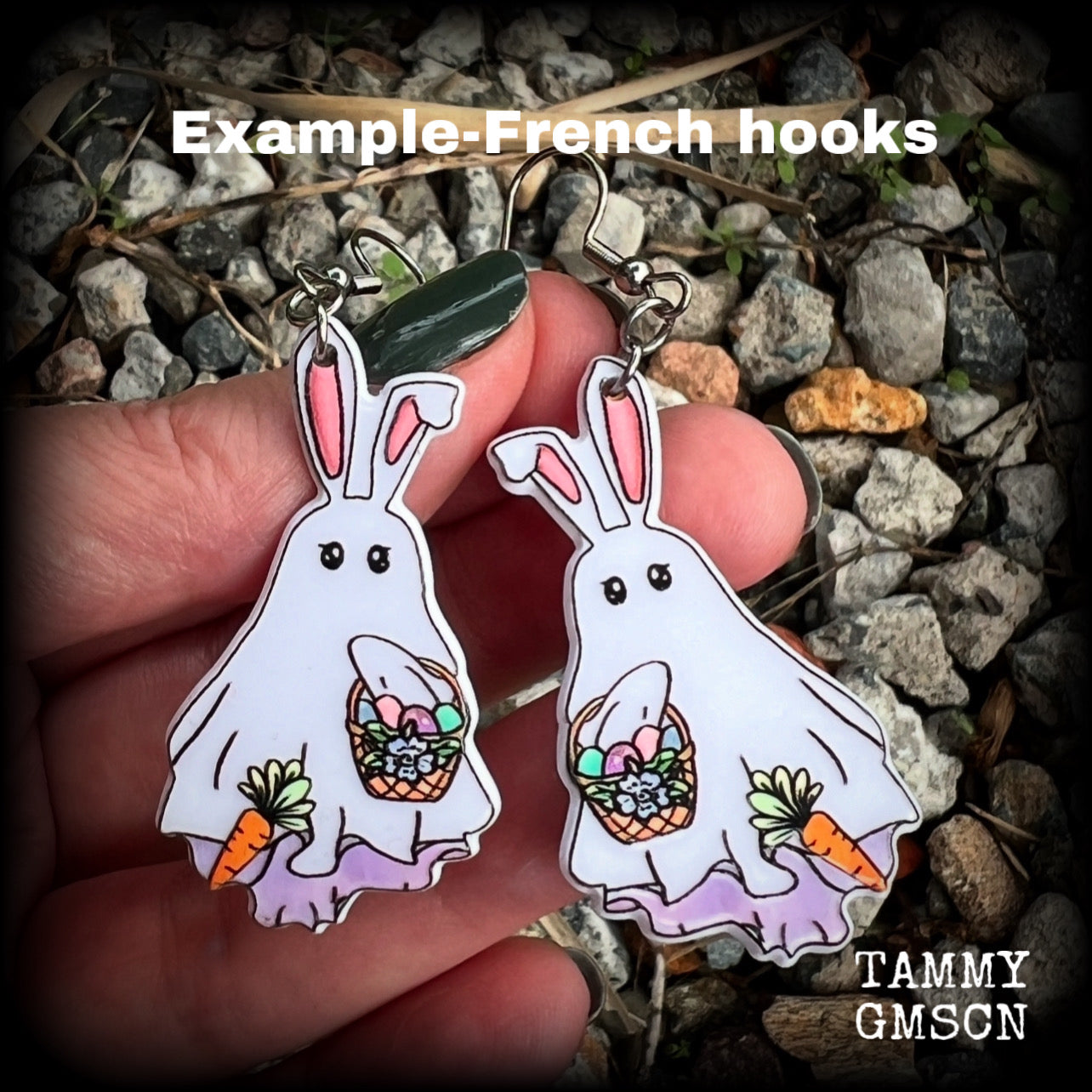These spooky cute earrings feature a ghost bunny draped in white sheet carrying a basket of easter eggs with his ears sticking out the top! Weighing in at only a few grams each, and are nice and dangly, measuring just under 7cms from tip to tip.