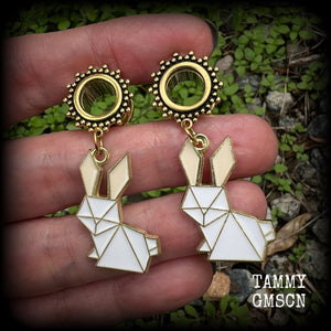 These earrings feature a pair of antique gold and white enamel origami rabbits, are nice and lightweight at only 6 grams each and measure approx 5cms from tip to tip. This pair has been made on 00 gauge (10mm) ornate surgical steel screw fit tunnels