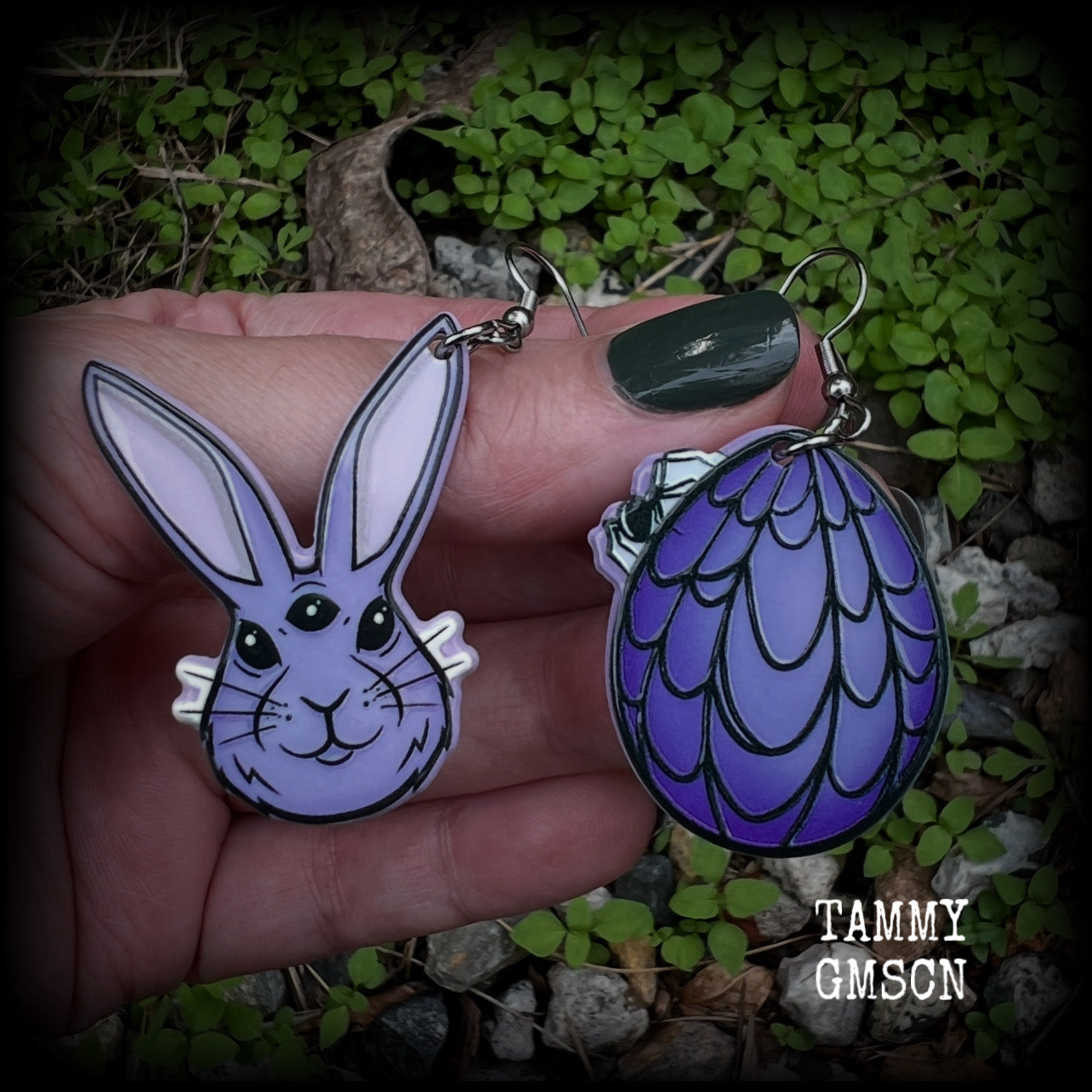 These earrings feature an all knowing, third eye bunny with easter egg draped in cobwebs, weighing in at only a few grams each, and are nice and dangly, measuring just over 6 cms from tip to tip. This pair has made on stainless steel french hooks