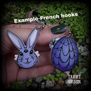 These earrings feature an all knowing, third eye bunny with easter egg draped in cobwebs, weighing in at only a few grams each, and are nice and dangly, measuring just over 6 cms from tip to tip. This pair has made on stainless steel french hooks